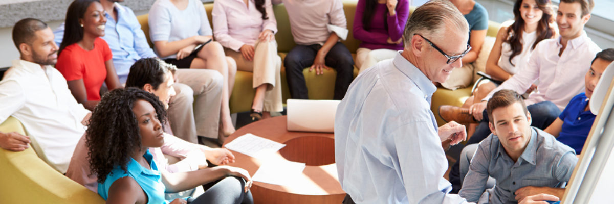 Group of people listening to presentation